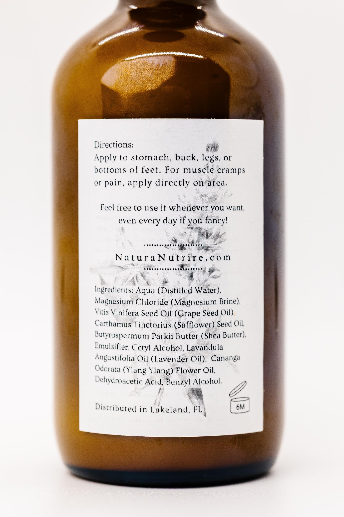 Brown bottle with a label on a white background