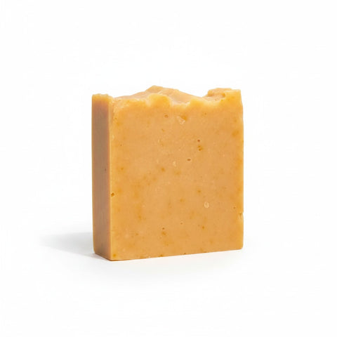 Walking on Sunshine Handcrafted Soap bar in golden orange-peach tones on a white background