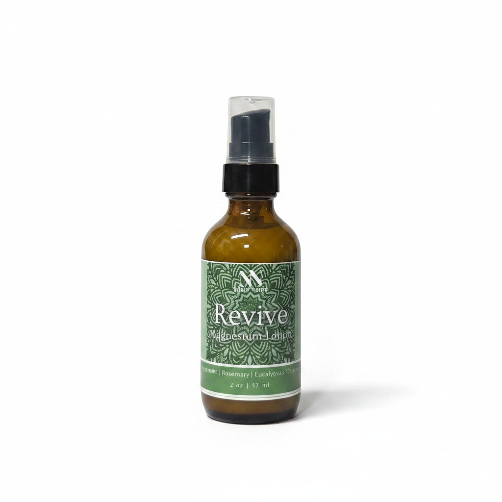 Revive Magnesium Lotion 2oz spray bottle with green mandala-patterned label on a white background