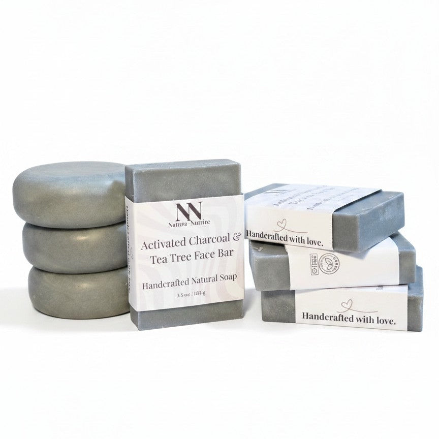 Stack of gray soap bars with their packaging on a white background