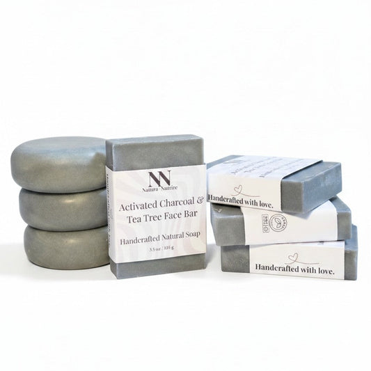 Stack of gray soap bars with their packaging on a white background