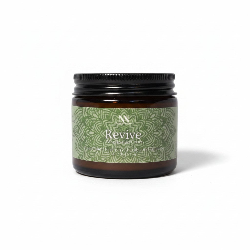 Revive Magnesium Cream 2oz jar with green mandala-patterned label on a white background