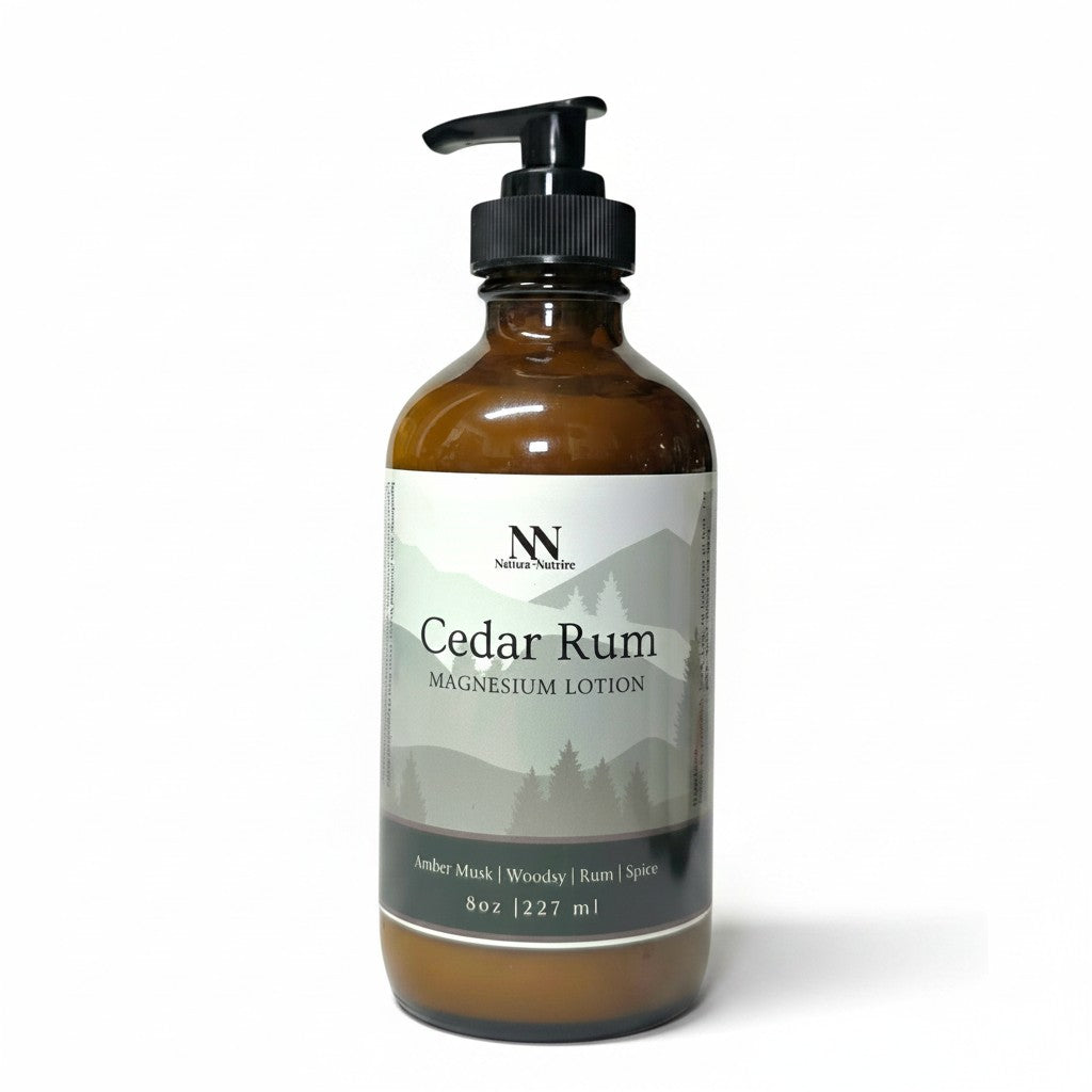 Cedar Rum Magnesium Lotion 8oz pump bottle with green and gray mountain-patterned label on a white background