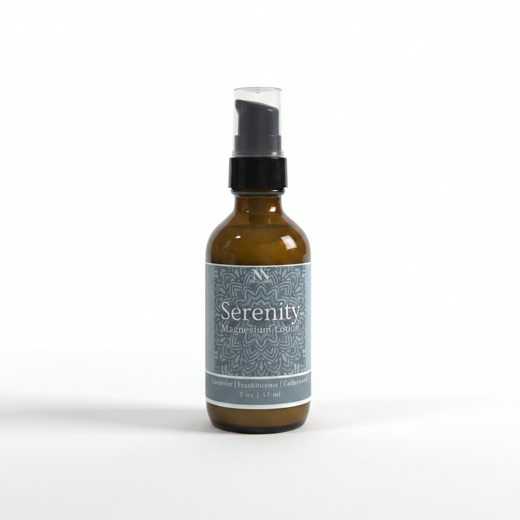 Serenity Magnesium Lotion 2oz spray bottle with teal mandala-patterned label on a white background
