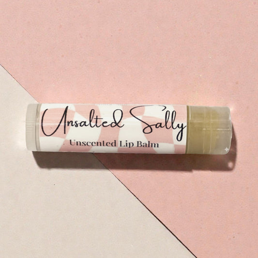 Lip balm with 'Unsalted Sally' branding on a pink and beige background